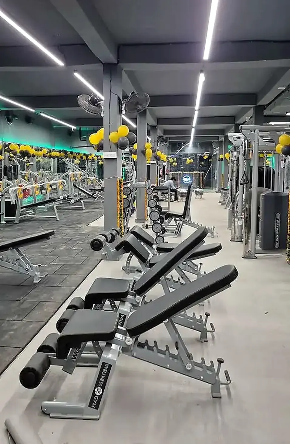 Adjustable benches and dumbbell area at Core Wave Gym
