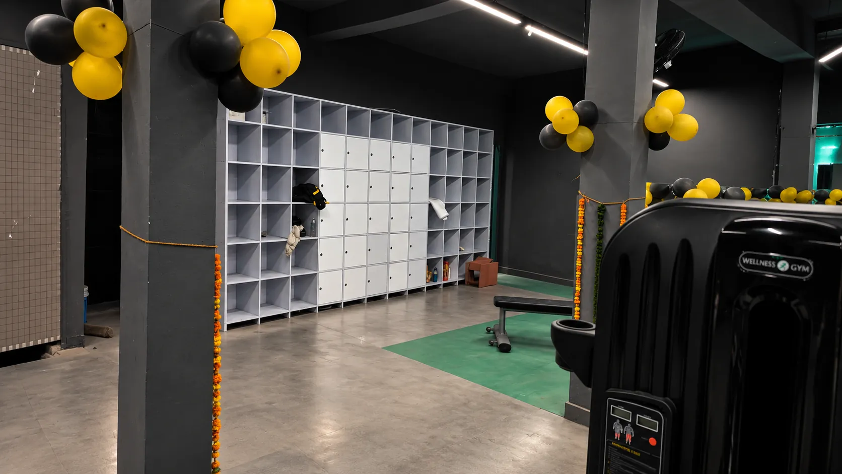 Locker wall and open changing area at Core Wave Gym